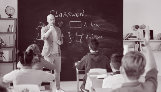Teacher teaching math and leveraging coaching skills